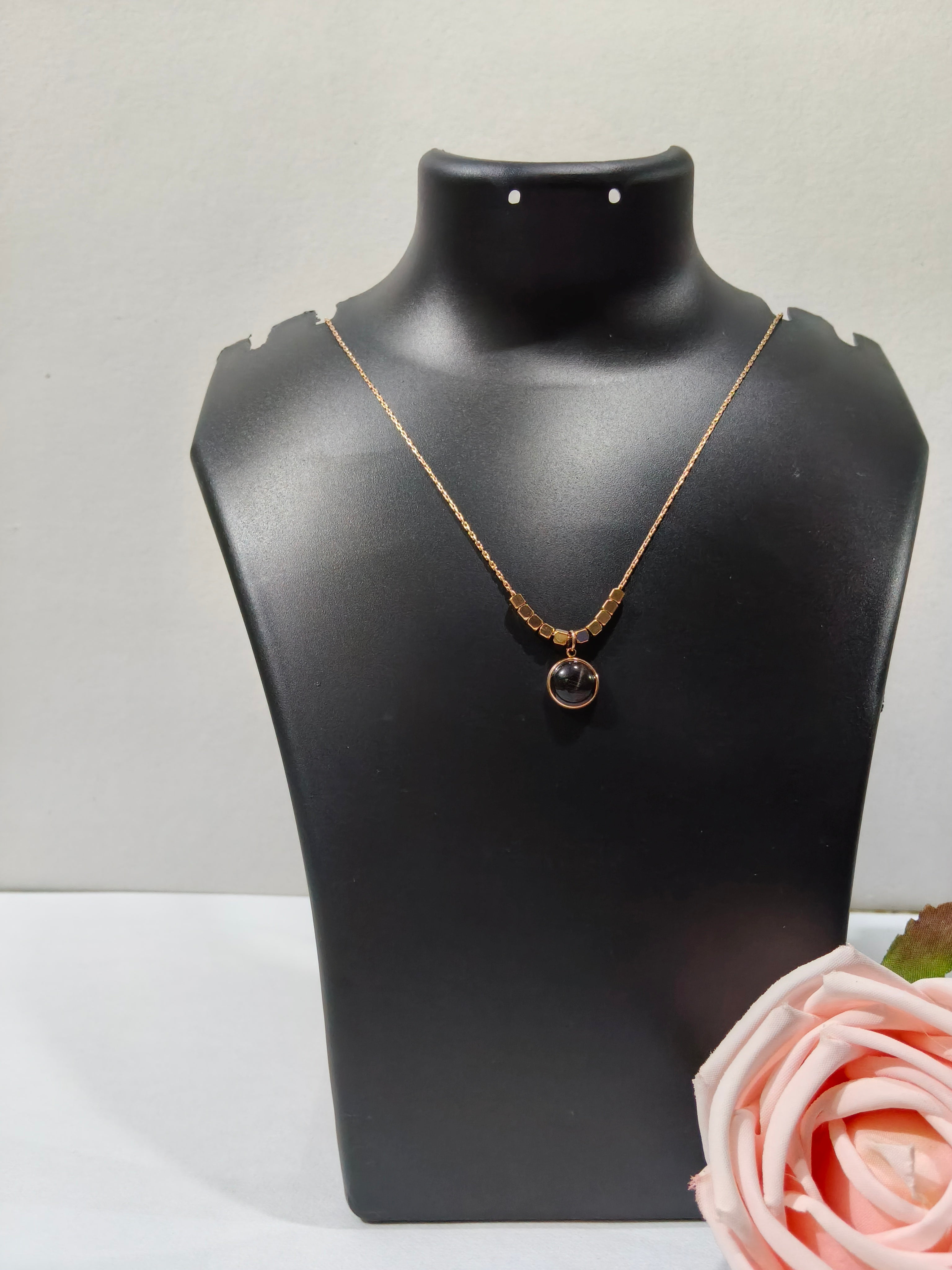 Midnight Muse Gold Pendant Necklace